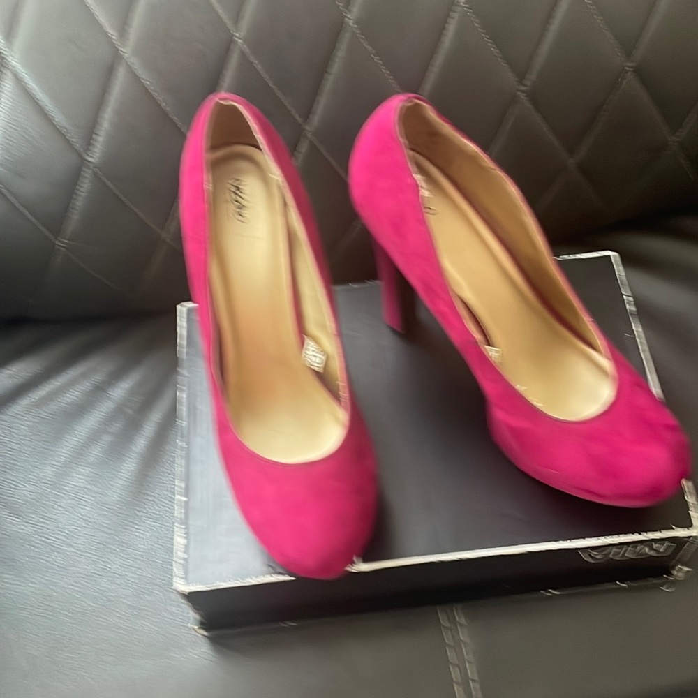 Pink suede platform heels.